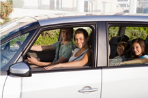 Family Riding In Car