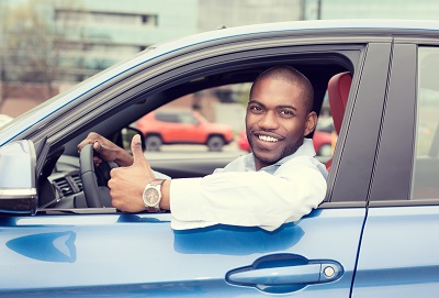 guy driving blue car