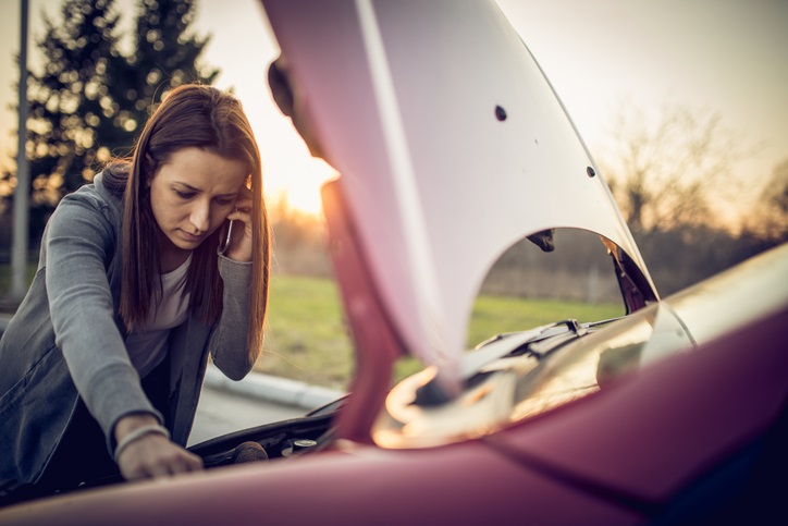 Driver Checking Her Engine