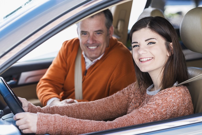 Father in Car With Teenage Daughter
