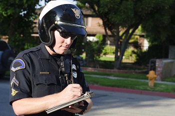 Motorcycle Cop Writing Ticket